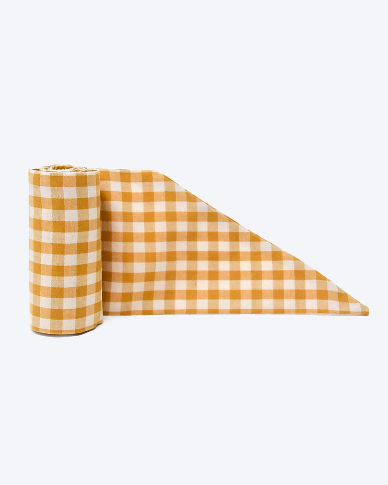 Dark yellow gingham necktie for dogs and cat. Like a rolled bandana but less fuss.