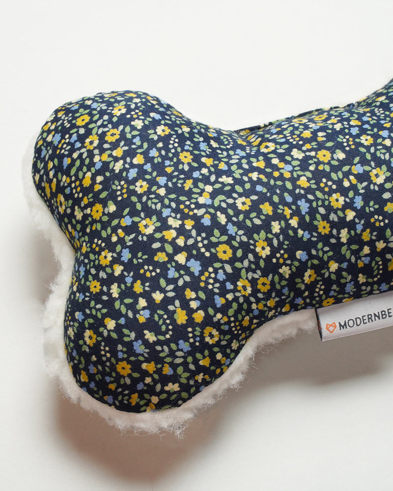 Plush Dog Toy filled with 100% organic lavender to help calm your pet. Dark Blue Floral.  Designed to give back 100%.