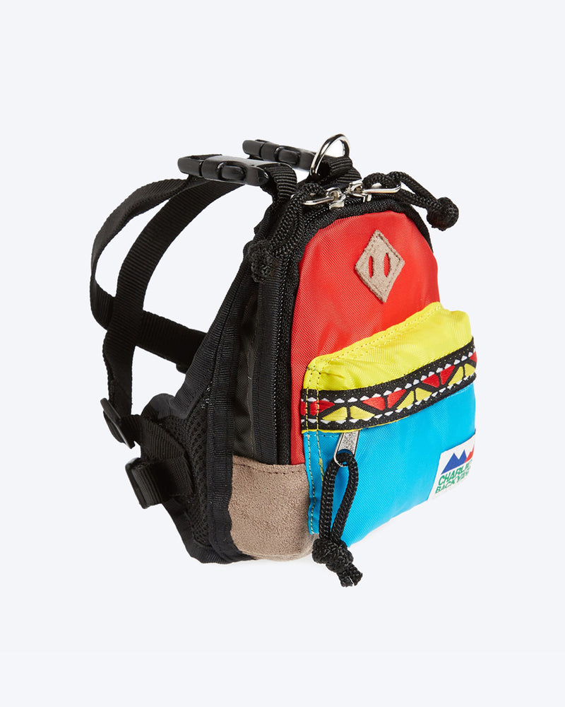 CHARLIES BACKPACK BY CHARLIE'S BACKYARD. RED, YELLOW, BLUE DOG BACKPACK WITH HARNESS STRAPS. SMALL, MEDIUM, LARGE.
