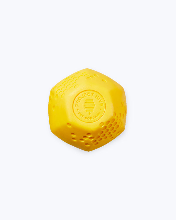 Yellow ball for dogs made by Project Hive.