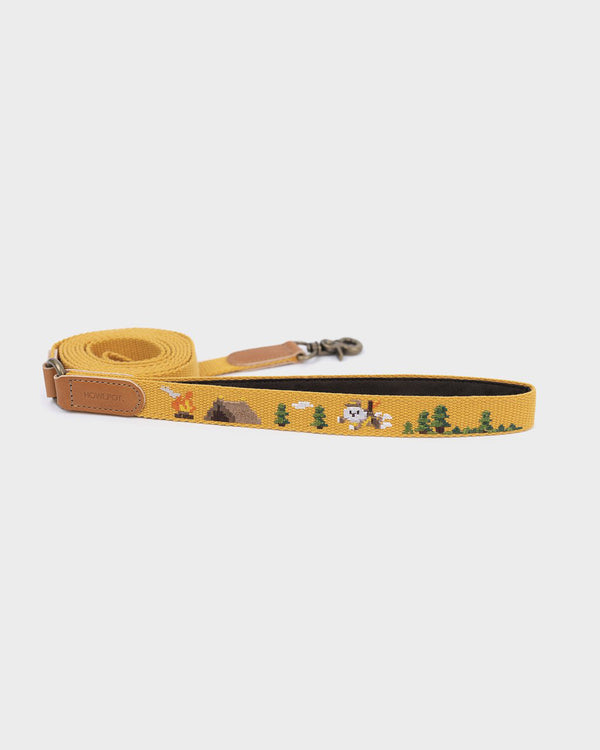 Dog leash and dog harness with superhero dog embroidered. Mustard and yellow color. On a French Bulldog