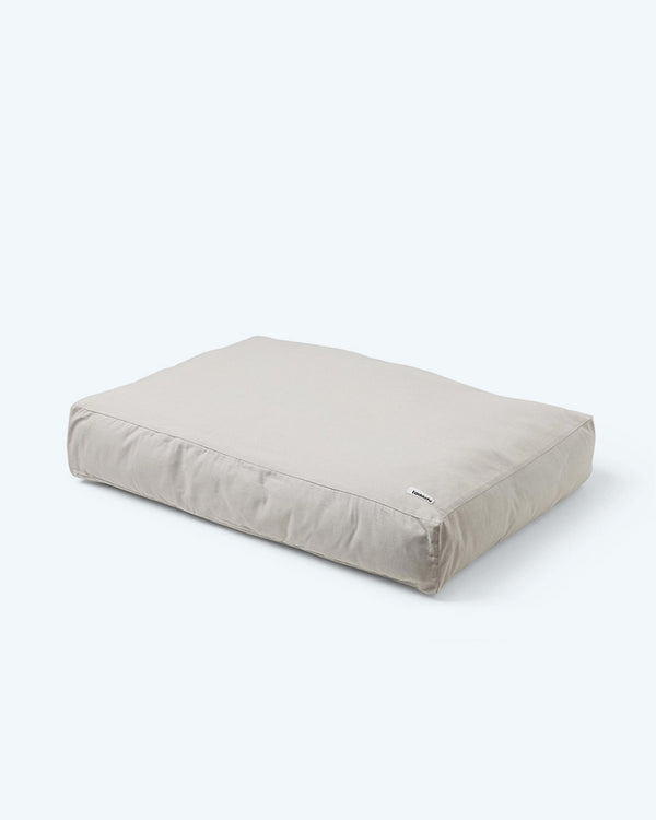 Light grey neutral rectangular dog bed.