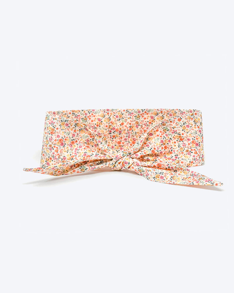 Floral necktie for dogs and cat. Like a rolled bandana but less fuss.
