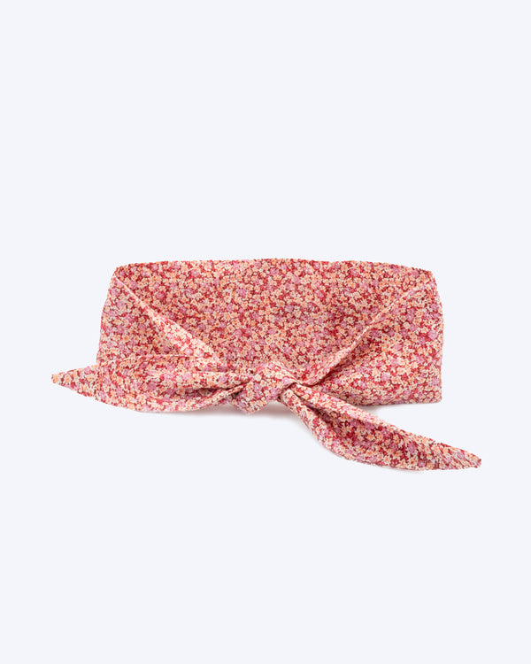Pink floral necktie for dogs and cat. Like a rolled bandana but less fuss.