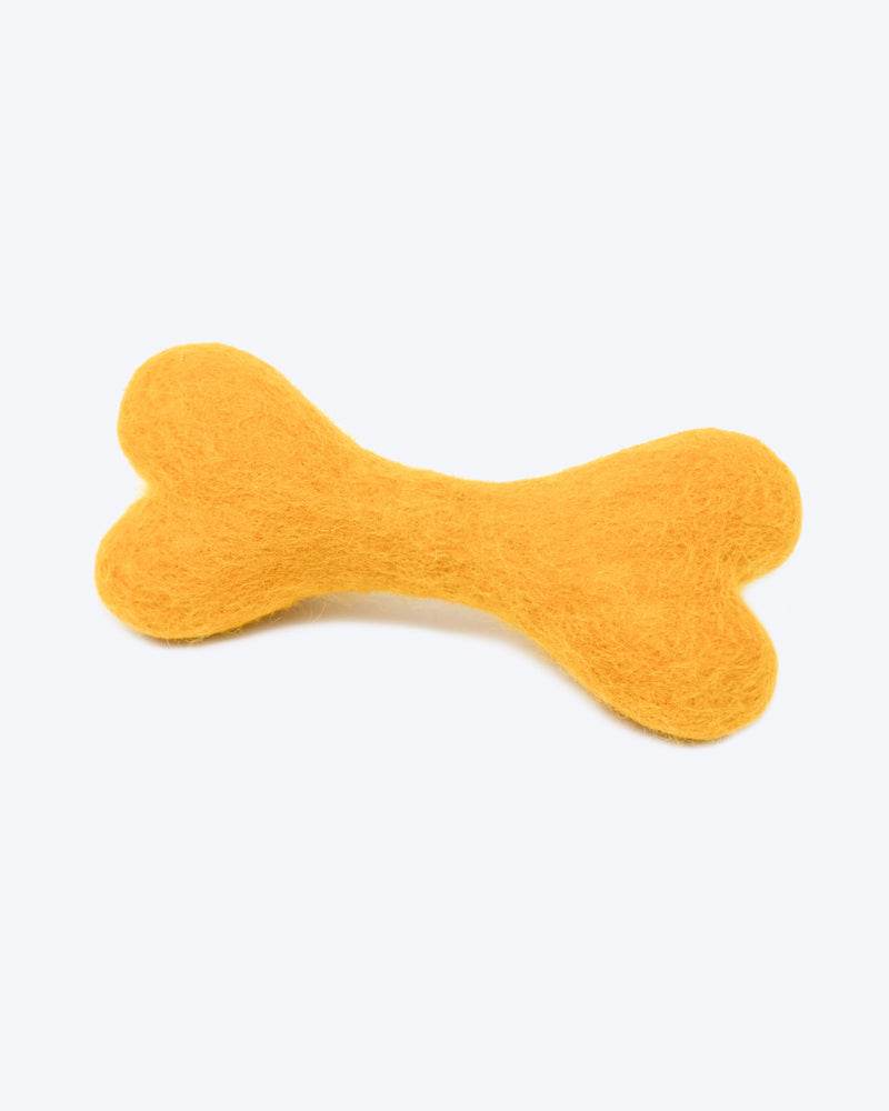 DOG BONE MADE OF 100% ORGANIC WOOL FELT DENSELY PACKED. ECO FRIENDLY. DURABLE. SMALL AND LARGE. YELLOW.